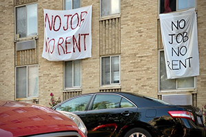 Banners against tenant eviction displayed on a controlled rent building in Washington. 
(AFP)
