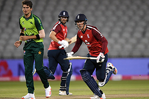 England batsmen Tom Banton and Dawid Malan in action in the third T20 International cricket against Pakistan played in front of empty stands at Old Trafford, Manchester, Britain, on September 1, 2020. (Reuters)