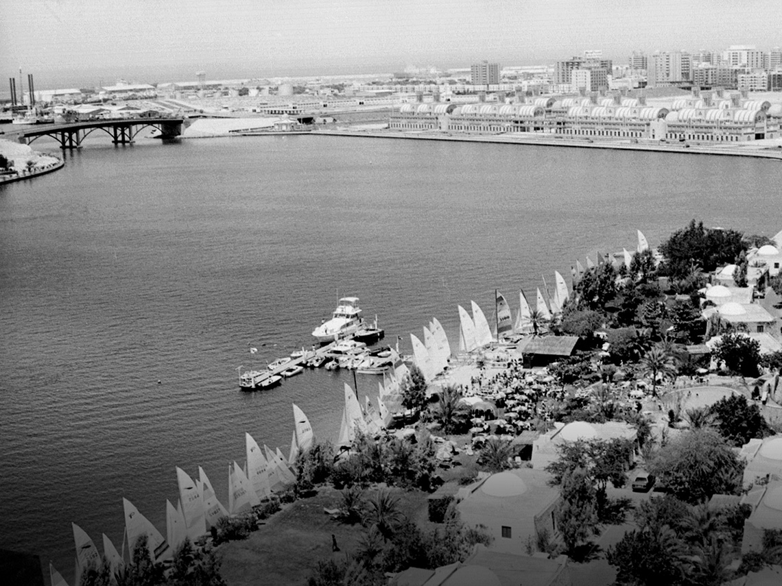 1984: View of Sharjah lagoon. Seen in the picture are sailboats in the foreground and the central souq in the horizon.