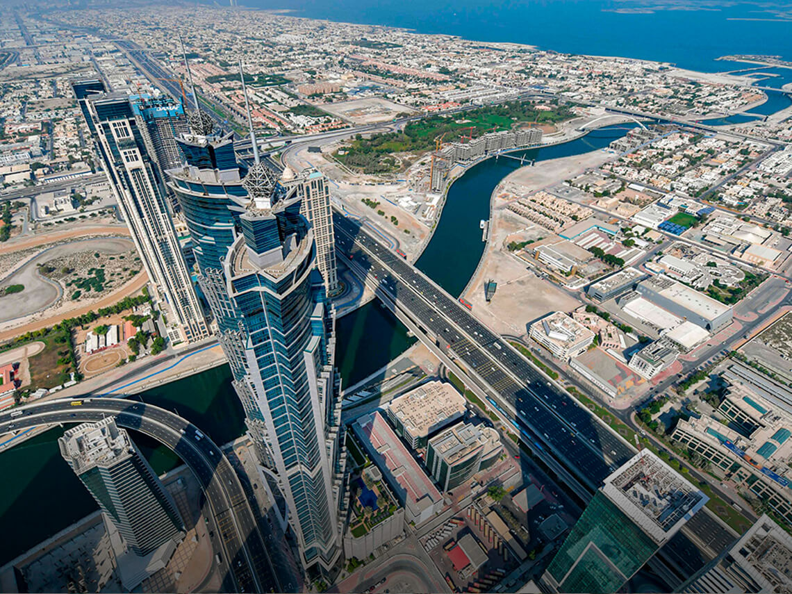 2020: Aerial view of Dubai Water Canal and part of Safa Park. The Dubai Water Canal project is a 3-kilometre long waterway starting from the Business Bay and goes down the sea in Jumeirah. The canal runs across the Sheikh Zayed Road, reaching Al Safa Park up to Al Wasl and Jumeirah roads.
