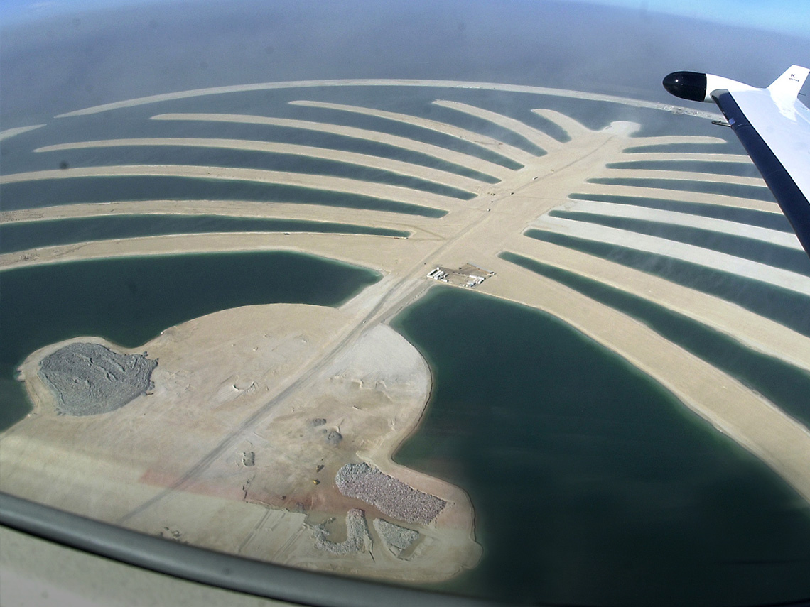 2003: An aircraft flies over The Palm Jumeirah. Construction began on the world’s largest man-made island in 2001, and the first homes were handed over in 2006.